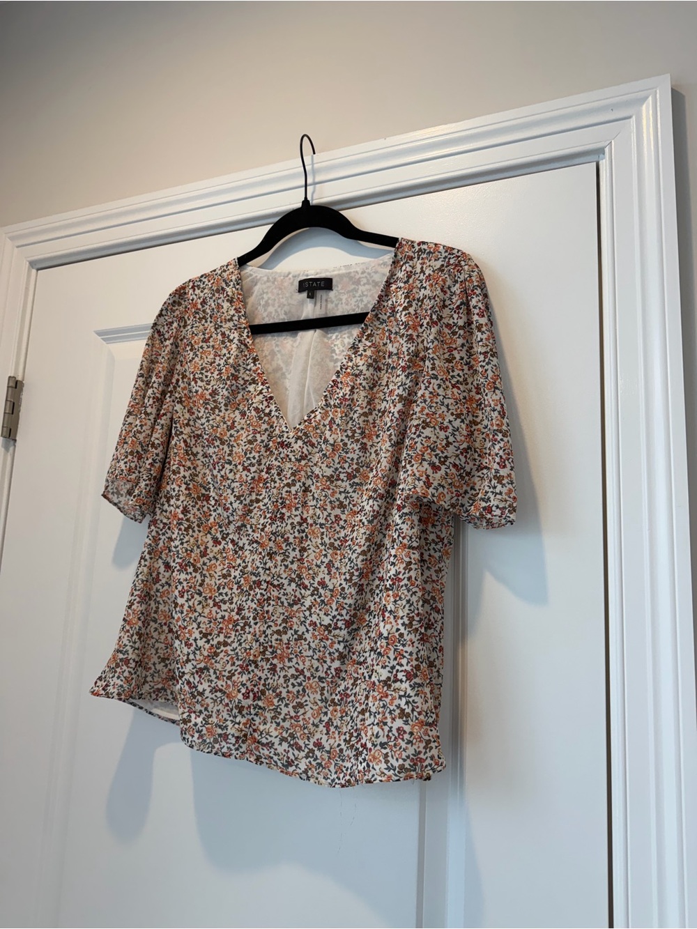 1. State Floral Deep V Blouse